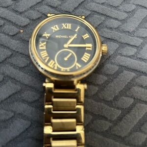 Michael Kors Gold and Black Roman Numeral Watch ladies